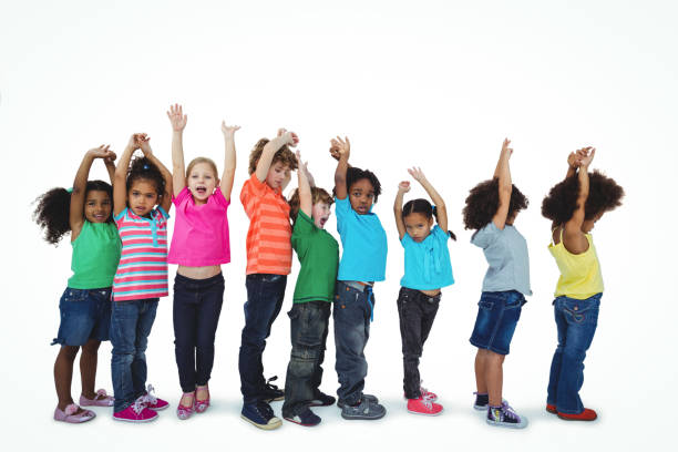 istock Group of kids standing in a line with raised arms 664015100