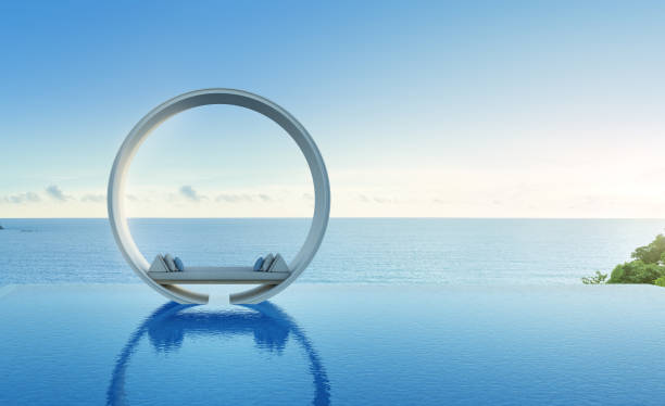 divano e piscina in lussuoso hotel con vista sul mare - infinity pool foto e immagini stock