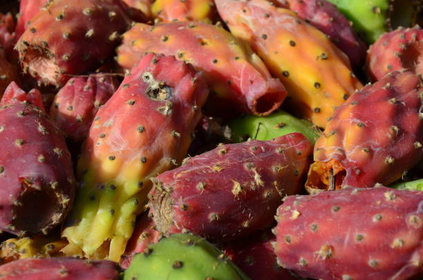 Prickly pears on a white enamel plate