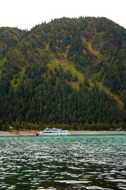 istock Small Cruise Ship Docked Near Seward Alaska 664018318