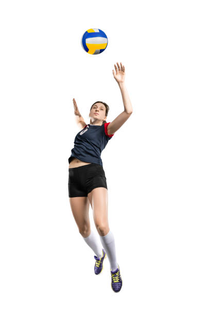 istock Female volleyball player hitting the ball 664023152