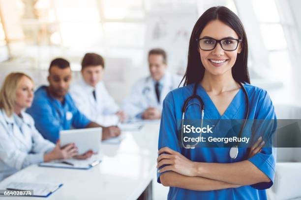 Medical Doctors At The Conference Stock Photo - Download Image Now - Nurse, Healthcare And Medicine, Group Of People