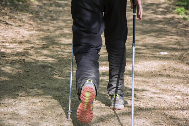 istock Man walking cross country 664028818