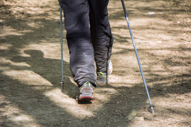 istock Man walking cross country 664028870
