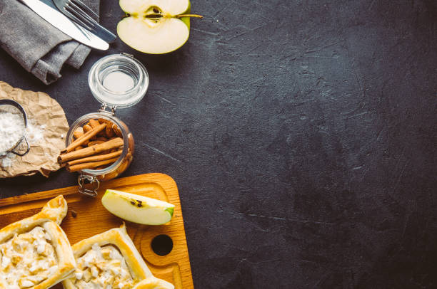 istock Apple pie and ingredients. Shooting in the dark style 664029112