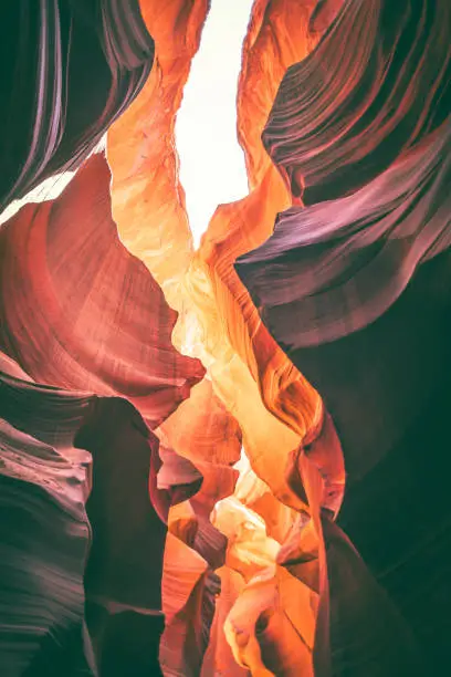 An abstract photo from inside lower Antelope Canyon in Page Arizona USA that is located nearby Grand Canyon and Glen Canyon. It shows the beautiful shapes, wave patterns and colors of the canyon.