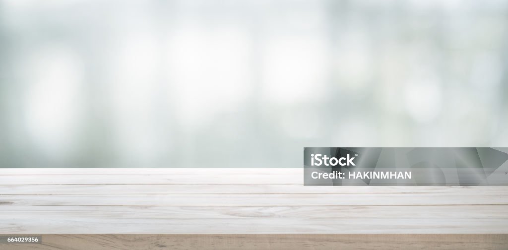 Wood table top on glass wall abstract background. Wood table top on white abstract background.For montage product display or design key visual layout Kitchen Counter Stock Photo