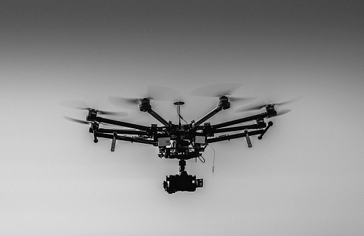 An octocopter flying with added grain