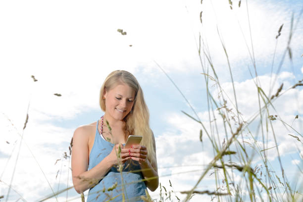 istock woman with smartphone 664048074