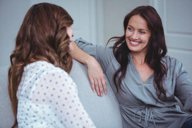 istock Two beautiful woman interacting with each other 664054942