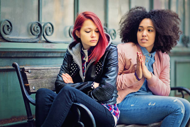 istock Girlfriends in conflict are sulking each other 664055568