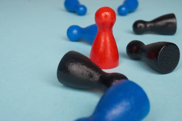 istock game pawns as symbol for success, competition, challenge and fighting with copy space 664058204