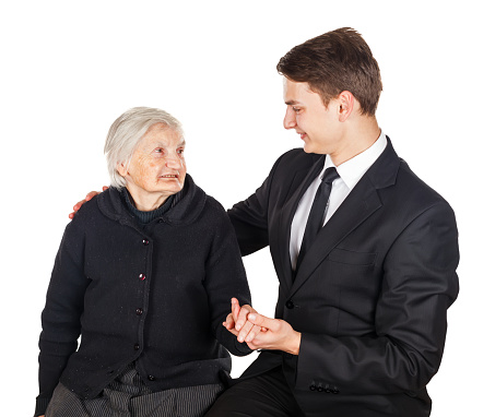 Photo of elderly woman and young businessman