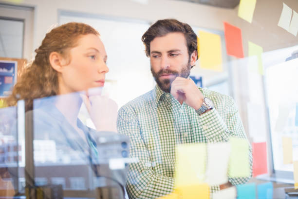 istock Thoughtful businesspeople 664064944