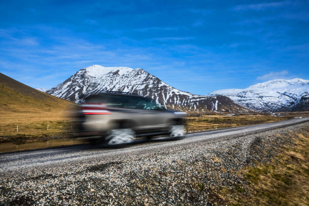 istock Driving on a country road in Iceland 664074898