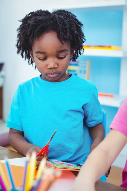 istock Girls making arts and crafts together 664077428