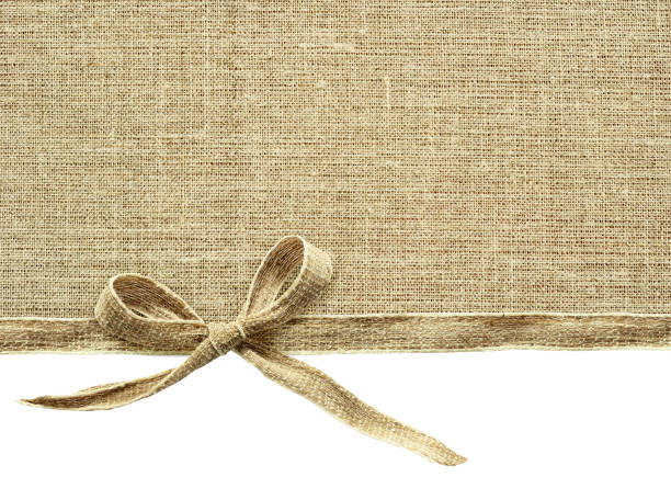 istock Beige canvas ribbon bow and textile 664087084