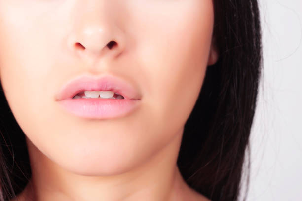 istock Closeup of beautiful young woman with light makeup 664098794