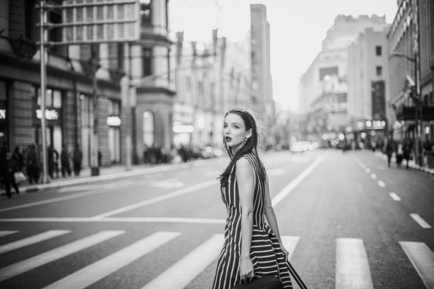 istock Woman walking on crosswalk 664101444