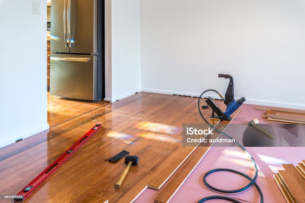 Hardwood floor installation Hardwood floor and installation tools Flooring Stock Photo