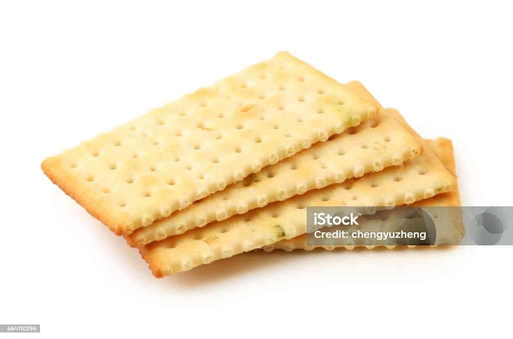 Salty crackers in square shape on white background Cracker - Snack Stock Photo