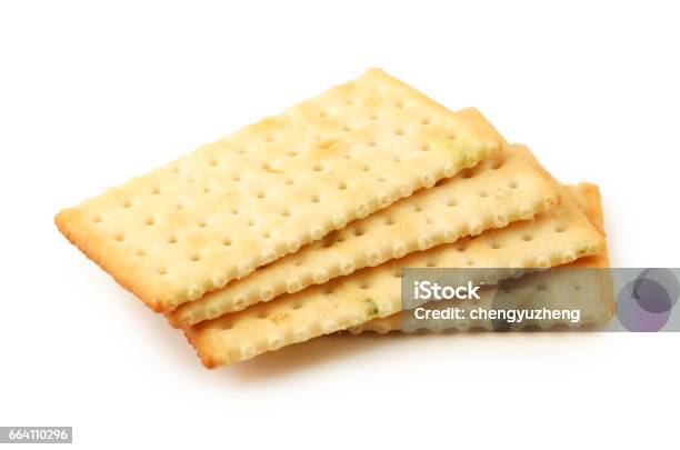 Salty Crackers In Square Shape On White Background Stock Photo - Download Image Now - Cracker - Snack, Saltine Cracker, White Background