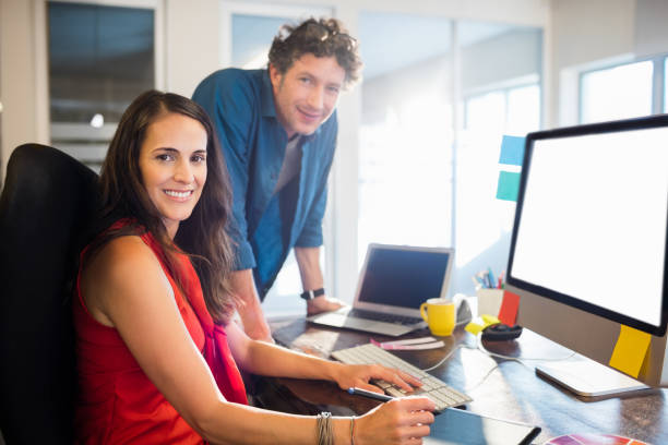 istock Business people posing together 664121954