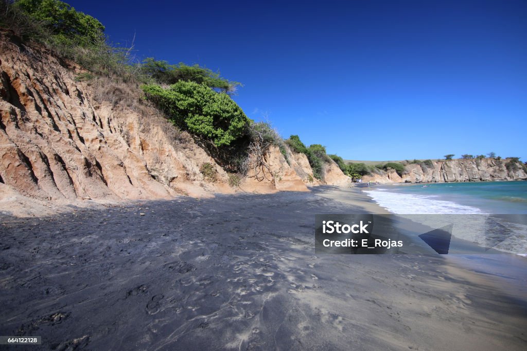 Black Sand Beach (Playa Negra), Vieques, Puerto Rico Volcanic material washes down through a stream and ends up at this beach on the island of Vieques, in Puerto Rico. Vieques Stock Photo
