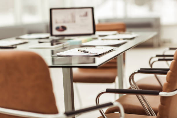 istock workplace with laptop and working documents for the business team in a modern office 664128276