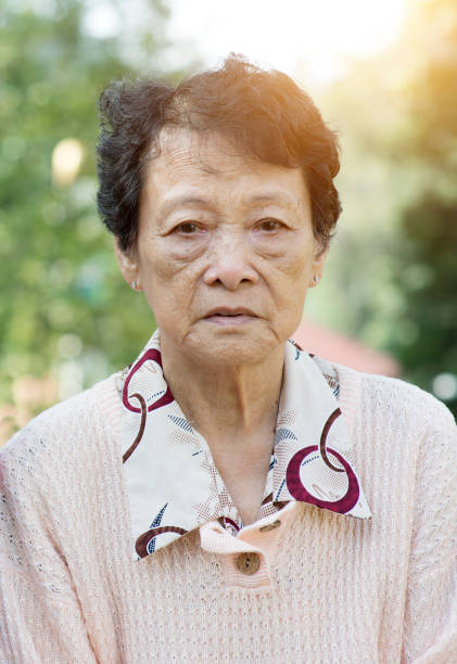 istock Sad Asian elderly woman 664131084