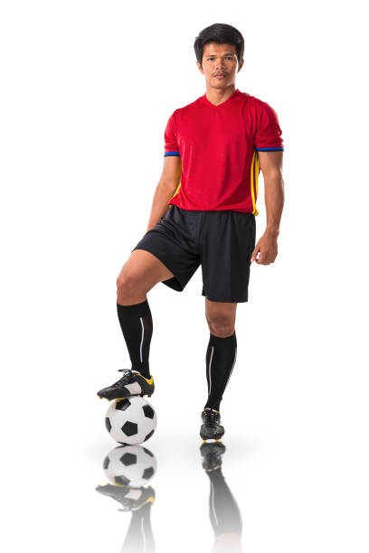 istock Soccer player with ball, full length, isolated on white 664134620