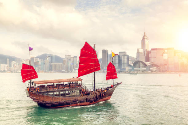 istock Sunset Over Victoria Harbour in Hong Kong 664144608