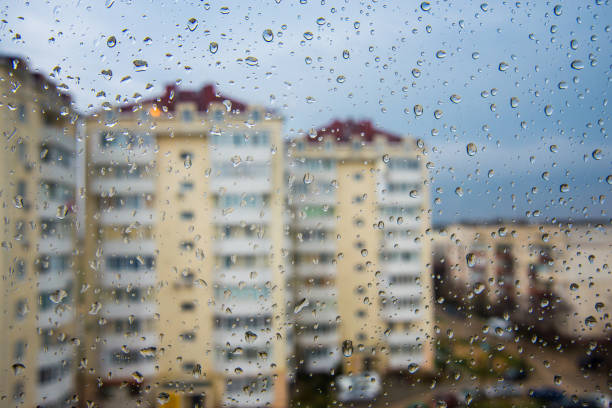 istock City district view through a window on a rainy day 664147920