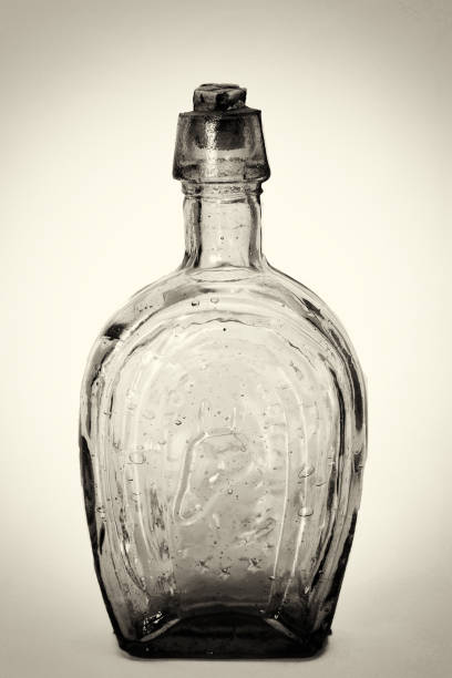 istock Old colourful bottles against a white background 664156774