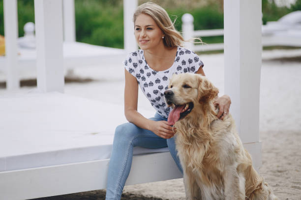 istock couple walking outdoors with her dog 664157204