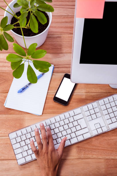 istock Part of hand typing on keyboard 664159906