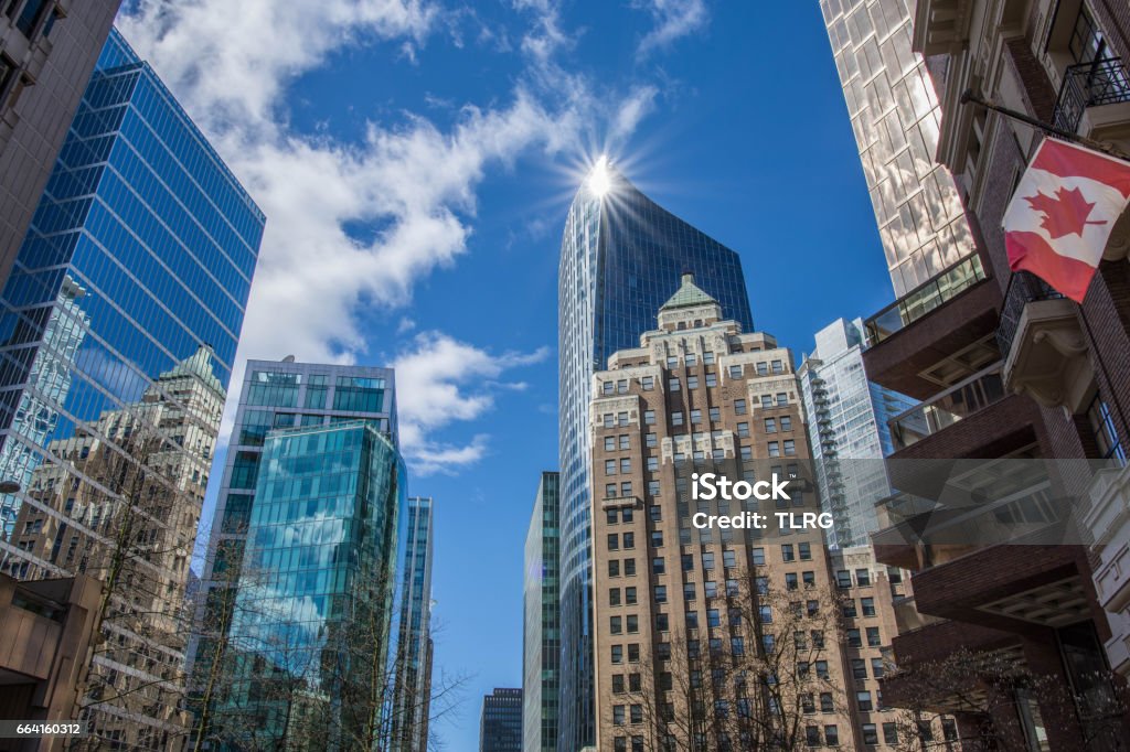 Urban Scene Low angle cityscape on a sunny spring day, showing various high rise office buildings Canada Stock Photo