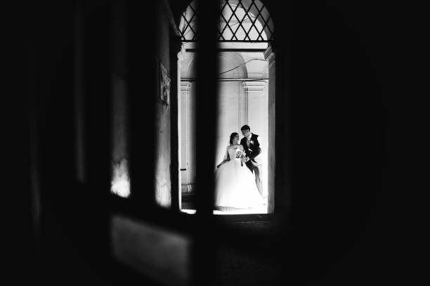 istock Newlyweds at the shadow alley 664160726