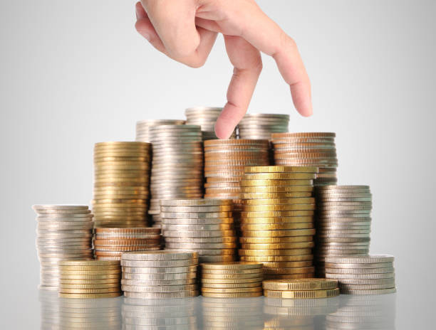 istock Hand human hand putting coin to money 664166728