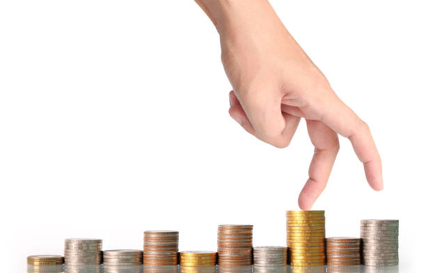 istock Hand human hand putting coin to money 664166730
