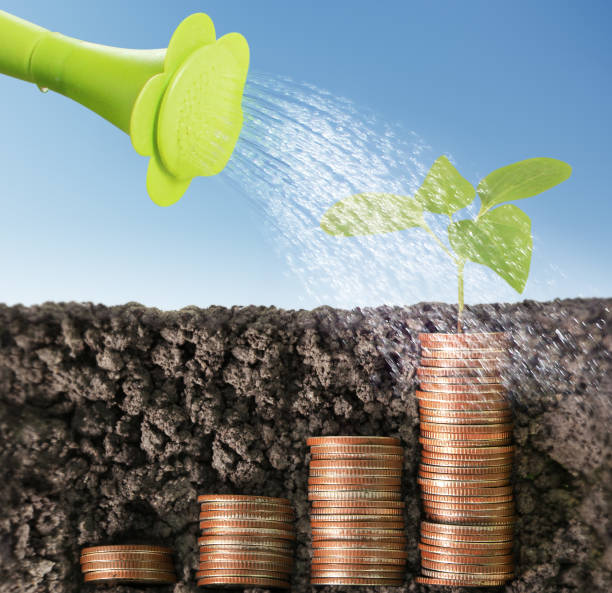 istock Coins graph stock market 664166734