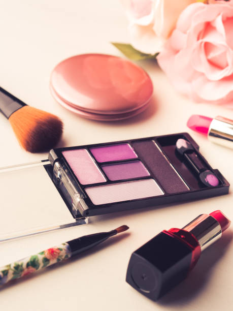 istock Make up products and tools with pink roses 664170914