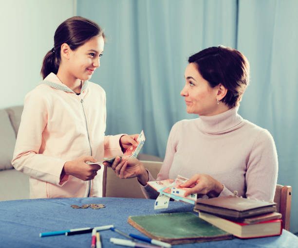 istock Daughter asks cash from mother 664170940