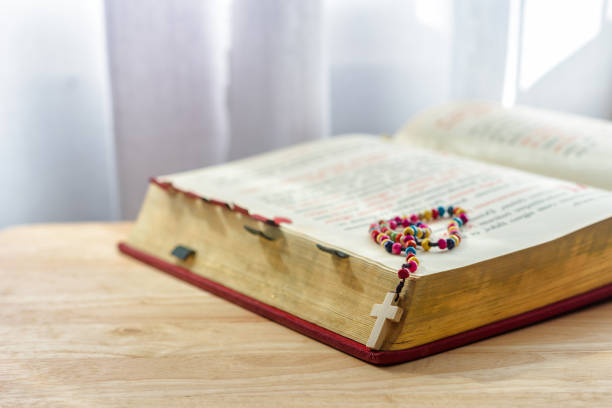istock Catholic rosary beads and bible 664177254