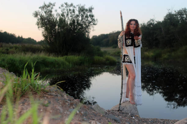 istock girl from the tribe with spear river 664183894