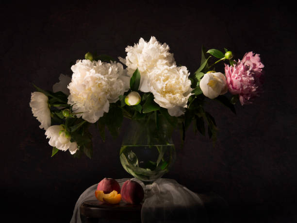 istock Still life with peonies and necatrines 664186460