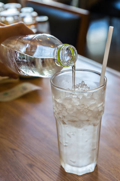 istock Drinking water pouring from pvc bottle. 664191614