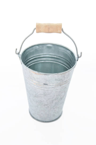 istock Grunge rustic zinc bucket on white background with woode handle. 664194640
