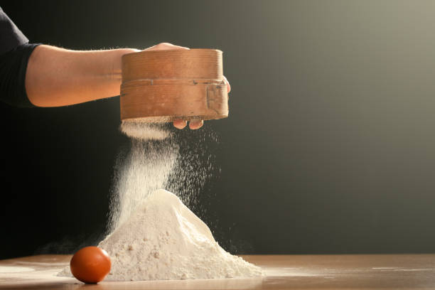 istock Making dough by female hands at home in kitchen 664195128