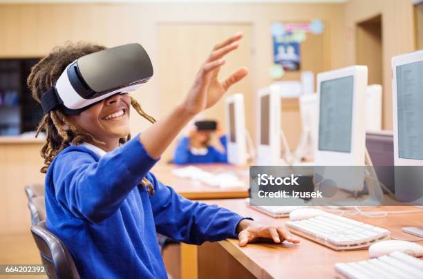 Afro American Student Using Virtual Reality Goggle At School Stock Photo - Download Image Now